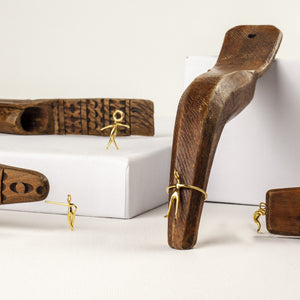Gold Caveman jewellery pieces