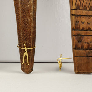 Gold Caveman jewellery pieces